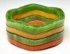 BB161 four marbled wavy bangles in marbled orange, butterscotch and green